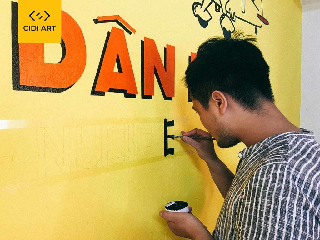 Vẽ tranh tường của hàng bánh mỳ dân bay